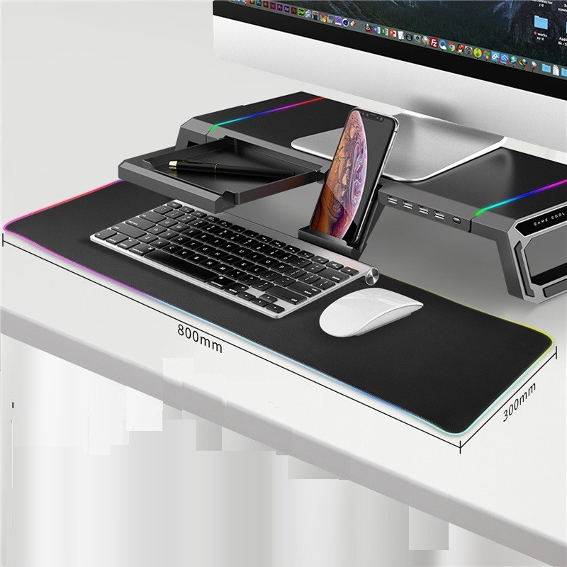 Hollow bottom monitor stand storing mini keyboard and mouse underneath