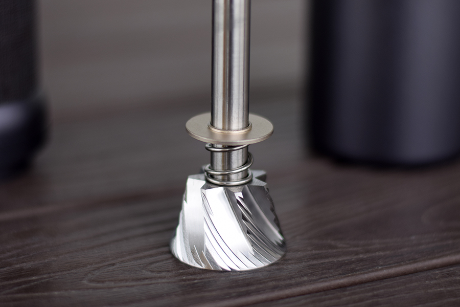 1zpresso Kultra manual coffee grinder in use.