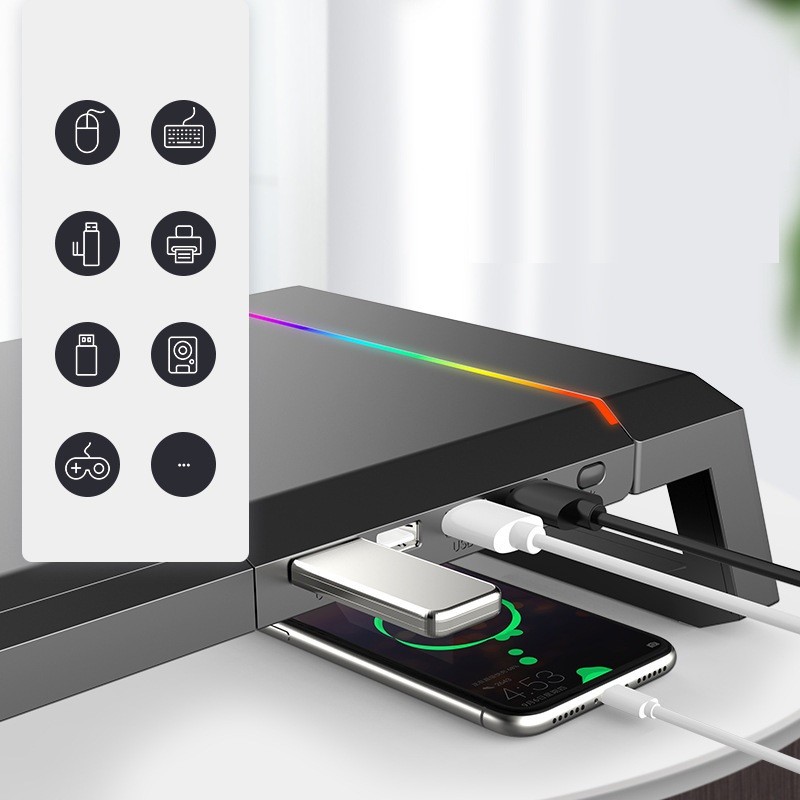 Computer monitor stand featuring integrated color light effects